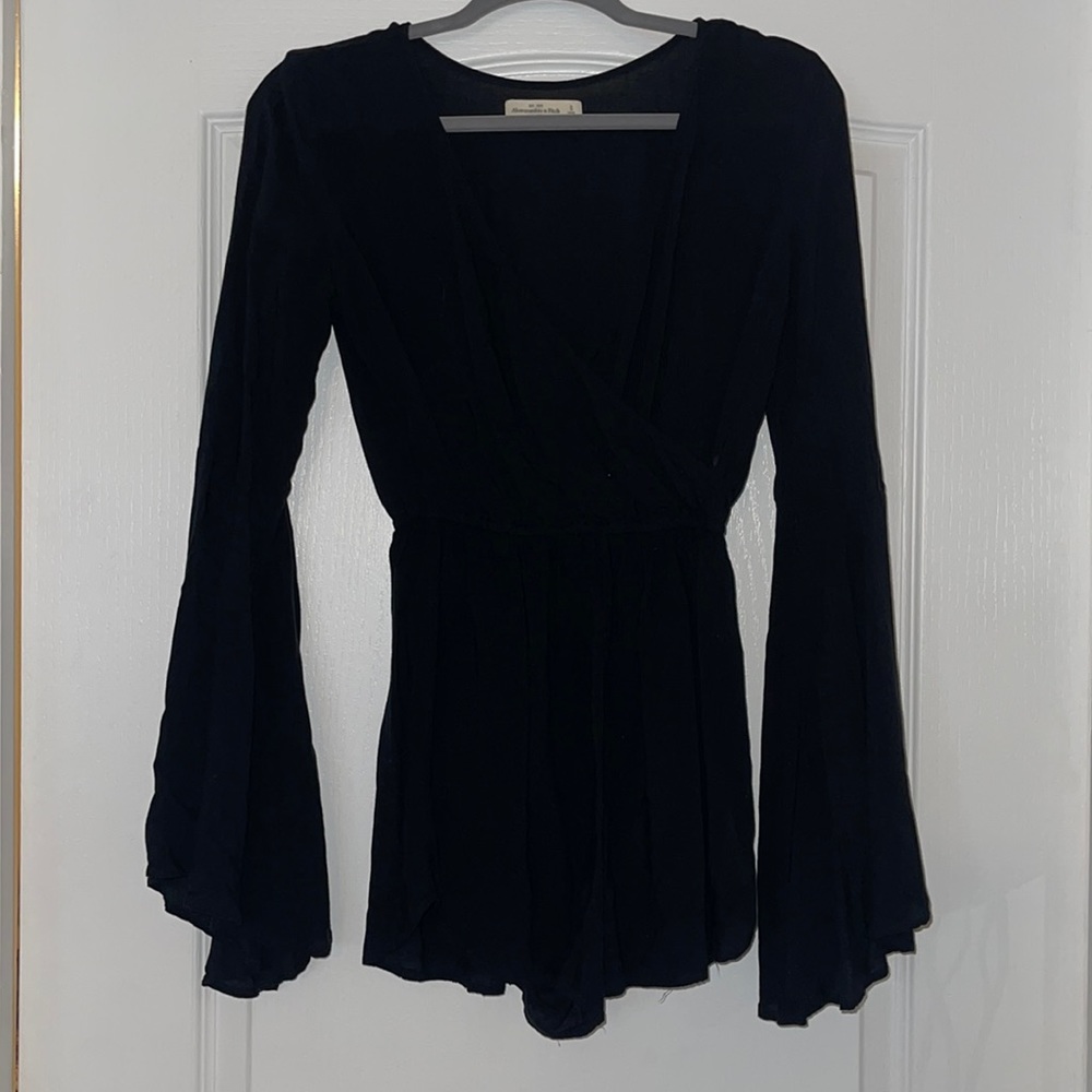 Black romper with bell sleeves